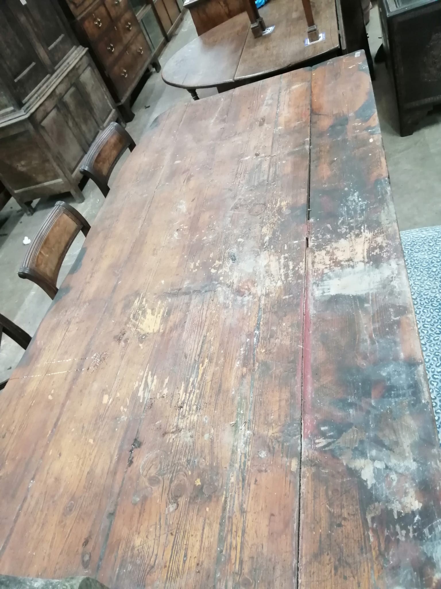 A 19th century rectangular pine planked top kitchen table, length 206cm, width 102cm, height 71cm *Please note the sale commences at 9am.
